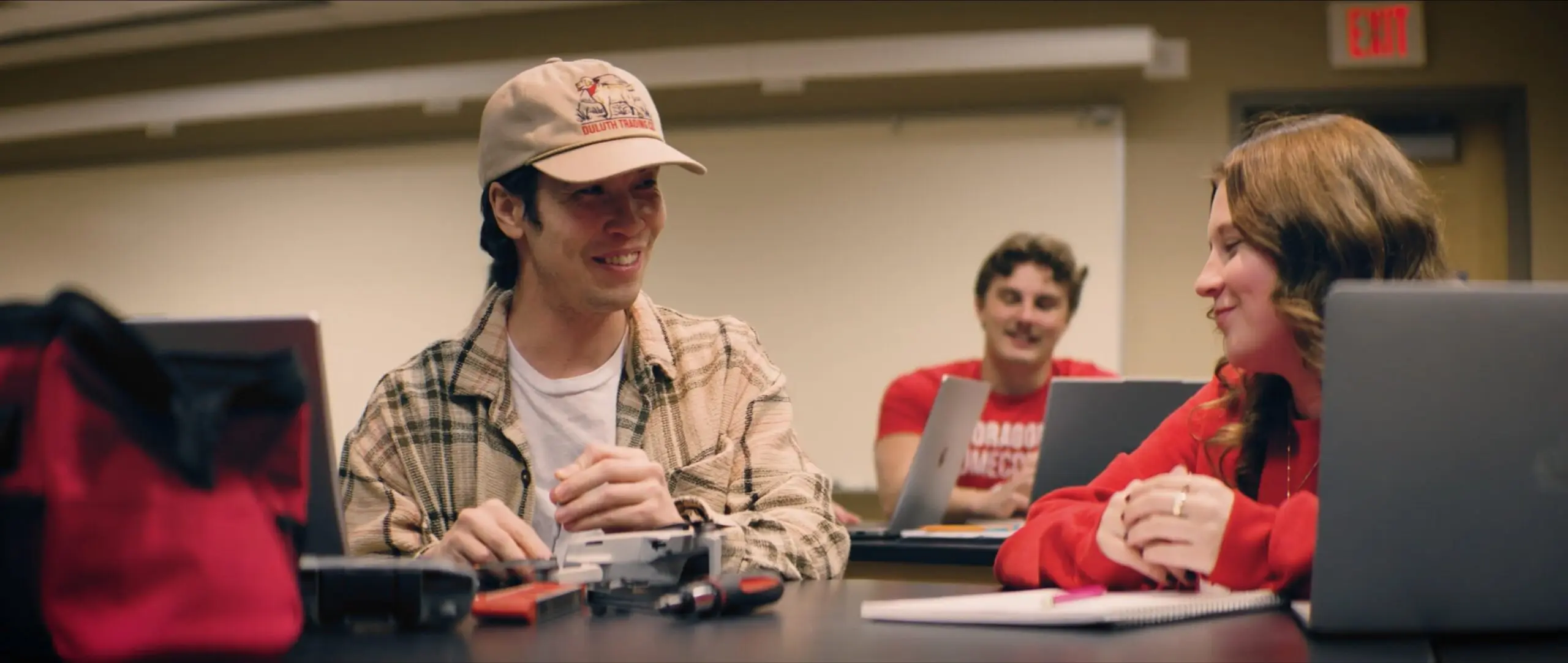 MSUM Honors College scholars laughing together in a classroom