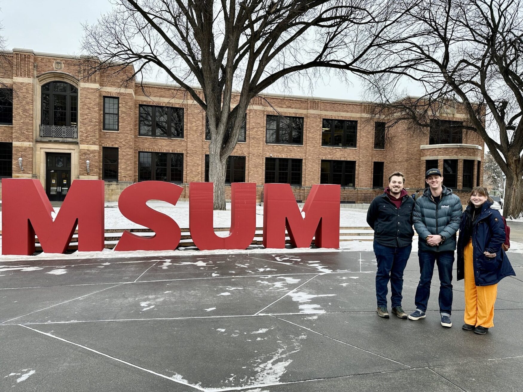 Max, Duncan, and 2023 film intern Alayna West at MSUM