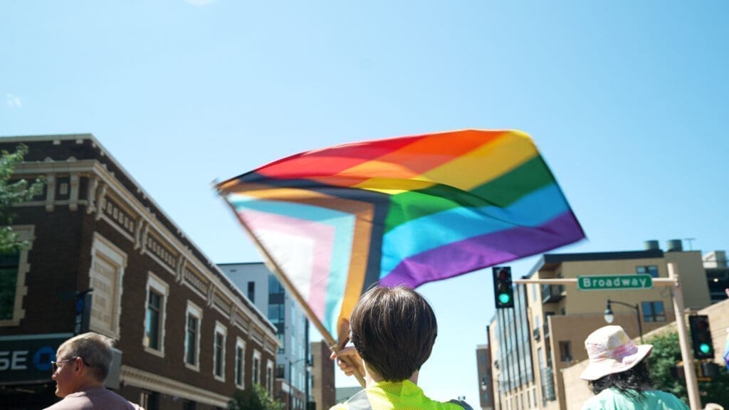 A pride flag waves in downtown Fargo