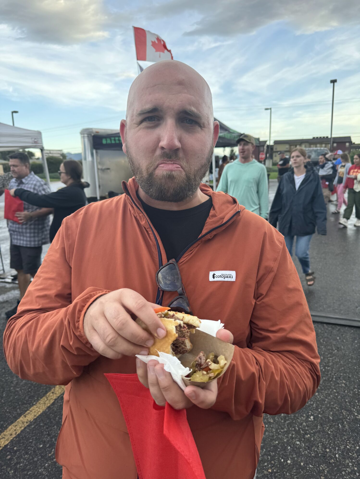 Max tries to enjoy a sandwich. He's not very convincing.