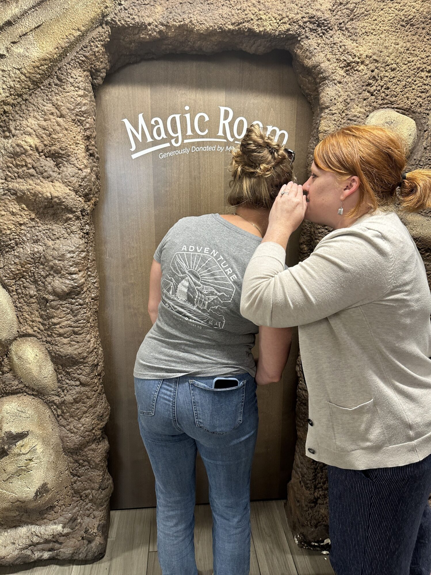 Annie receives the secret password to get into the Magic Room at RMHC of the Red River Valley's Jakelle