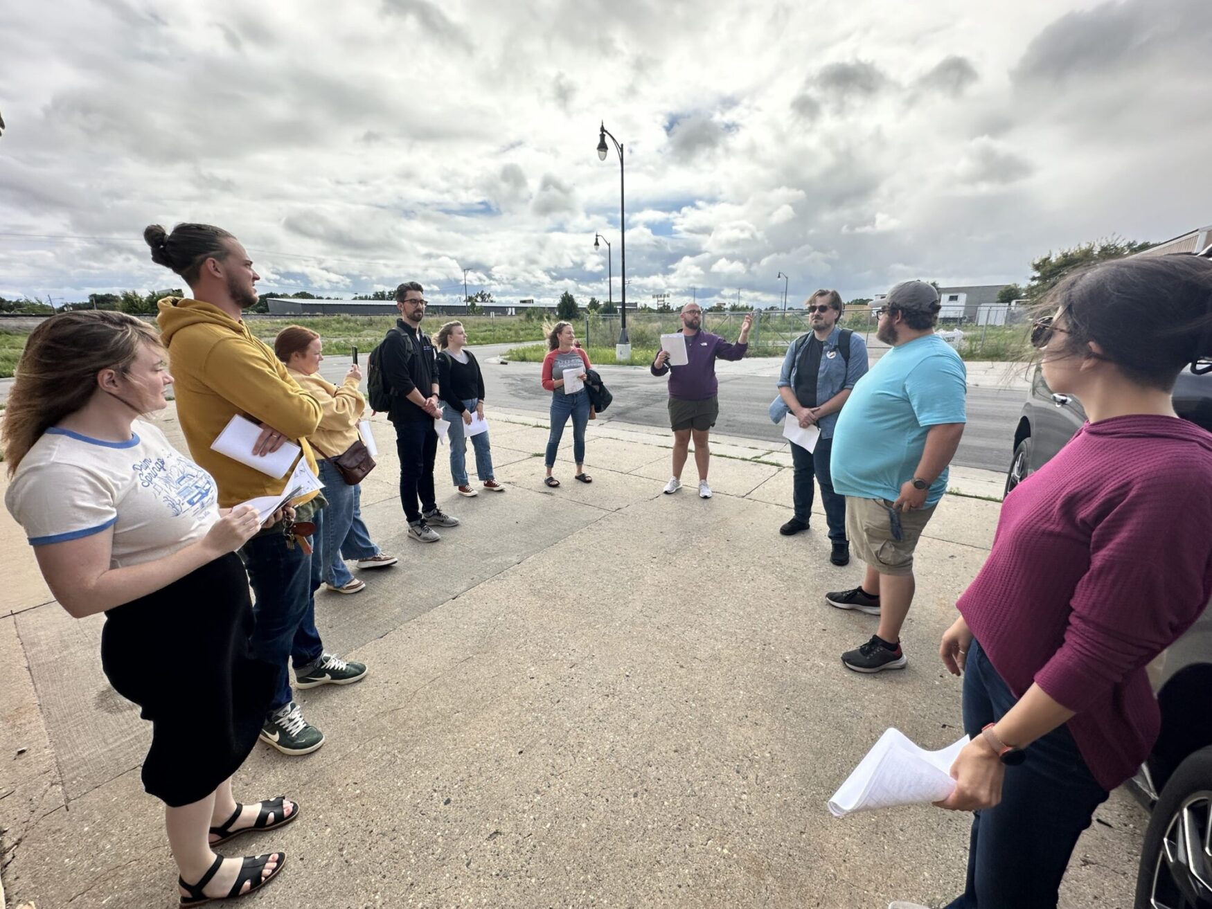 Max discusses some plans with the Tellwell team