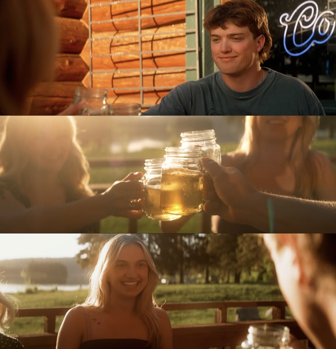 A series of three warm-toned images captures a relaxed summer evening hangout. In the top image, a young man smiles while sitting outside a log building, partially facing a friend. In the middle image, a group of friends clinks mason jars filled with light beverages as golden sunlight filters through the scene. In the bottom image, a young woman with long blonde hair smiles brightly across the table, with a lake and trees softly blurred in the background.